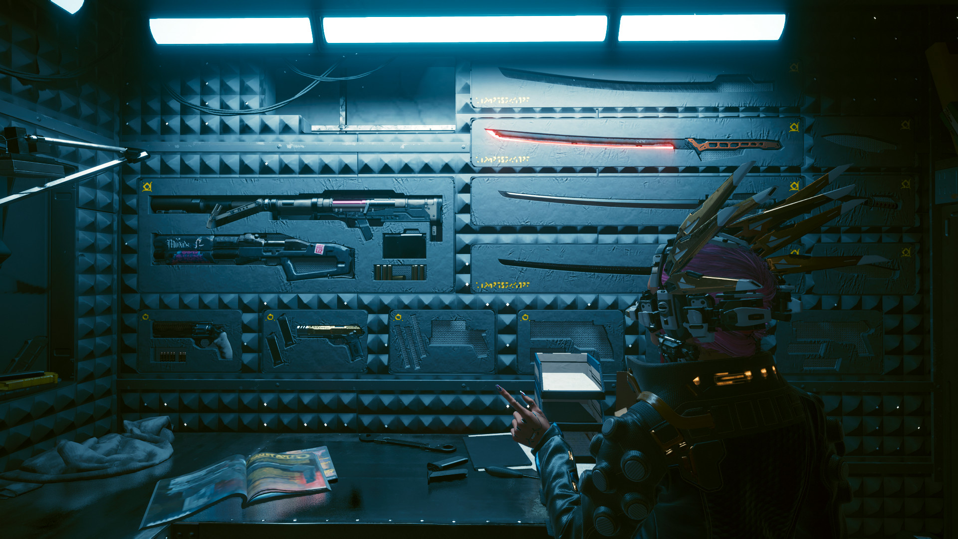 A full display of all 30 iconic weapons on V's apartment stash wall in Cyberpunk 2077