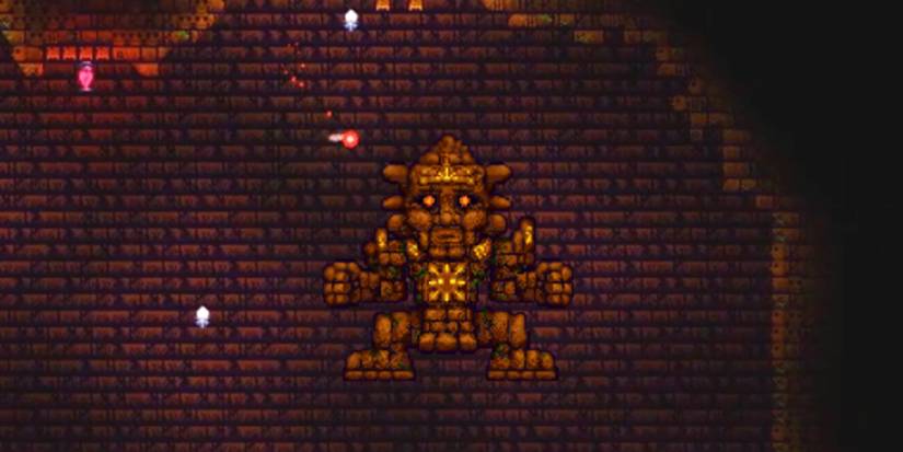 Player fighting Golem in a prepared arena