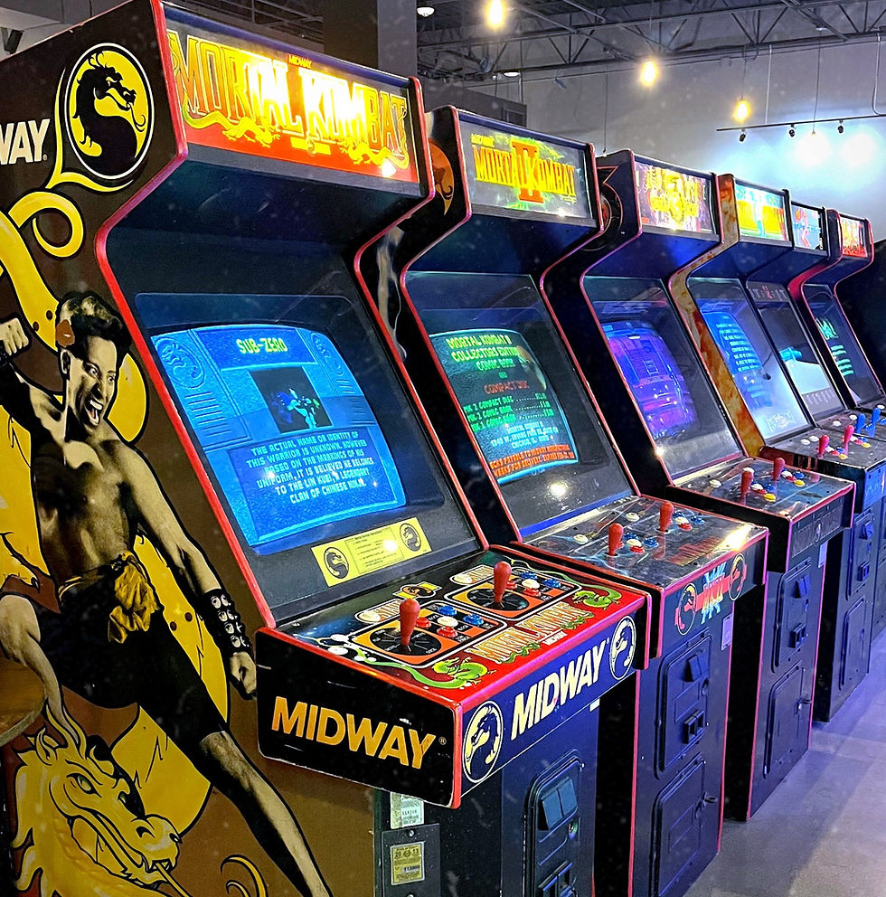 A collection of classic arcade cabinets showing the variety of hardware designs from the 90s