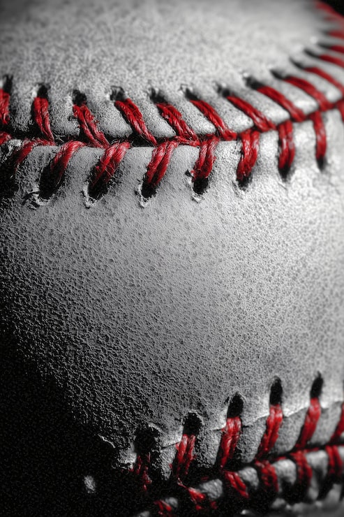 Macro closeup of baseball stitching for 4K phone wallpaper