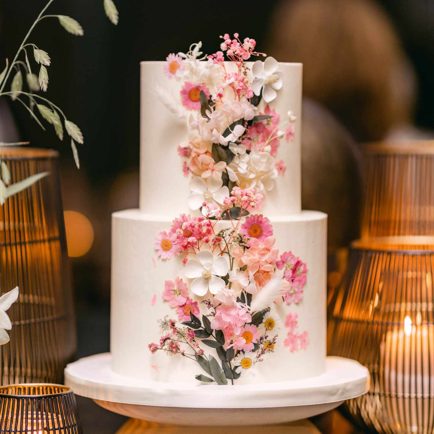 Elegant multi-tier wedding cake with floral decorations