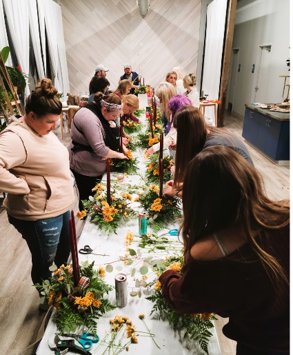 A variety of fresh wholesale flowers ready for a design class