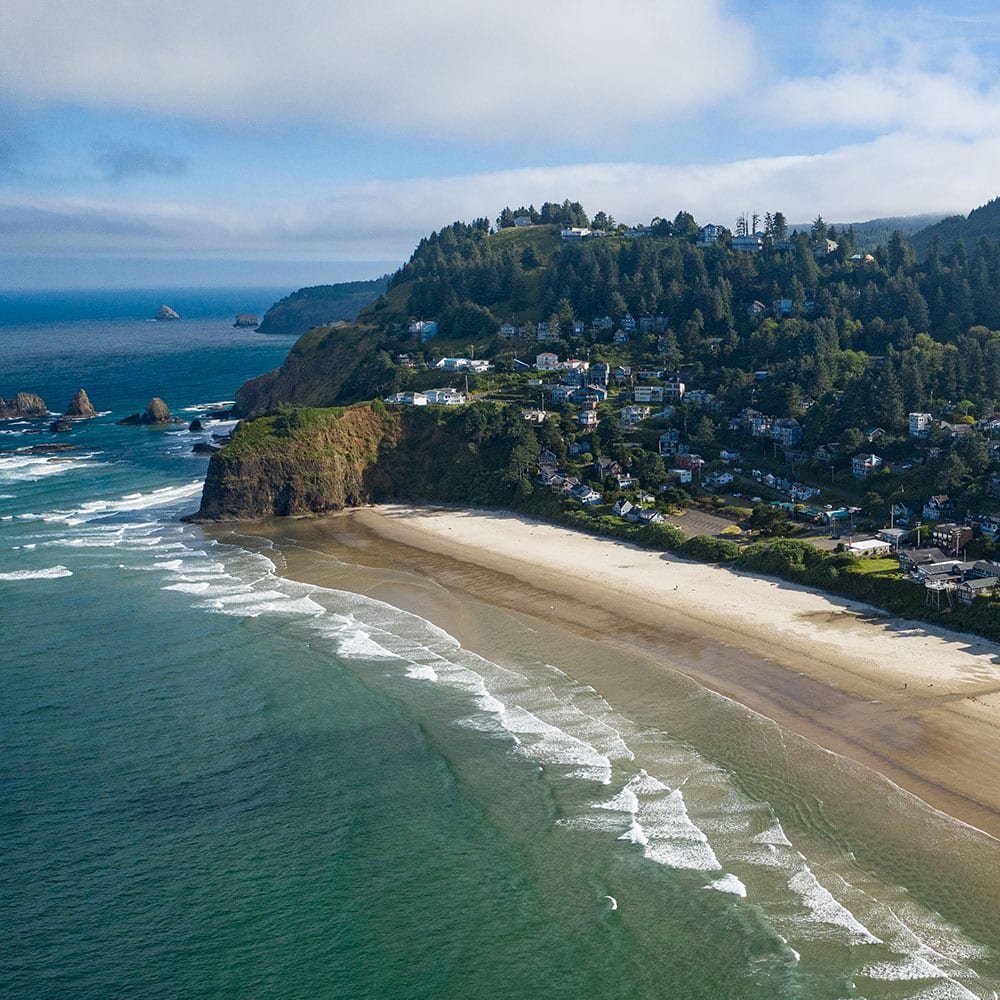 Aerial view of Oceanside Oregon coastline and Three Arch Rocks
