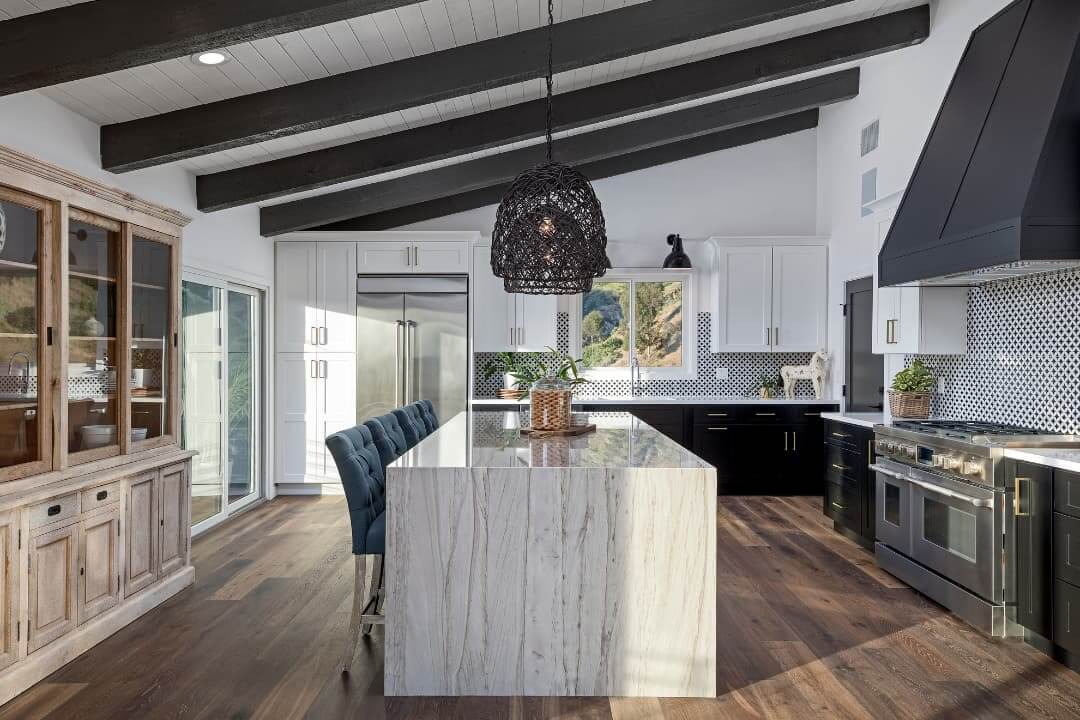 Luxury kitchen remodel in Oconomowoc featuring custom cabinetry and modern lighting