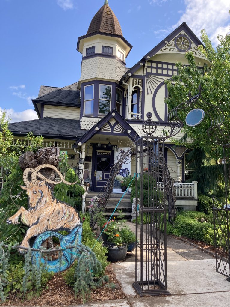 Exterior of Capricorn Manor showing Queen Anne Victorian architecture in Drain Oregon