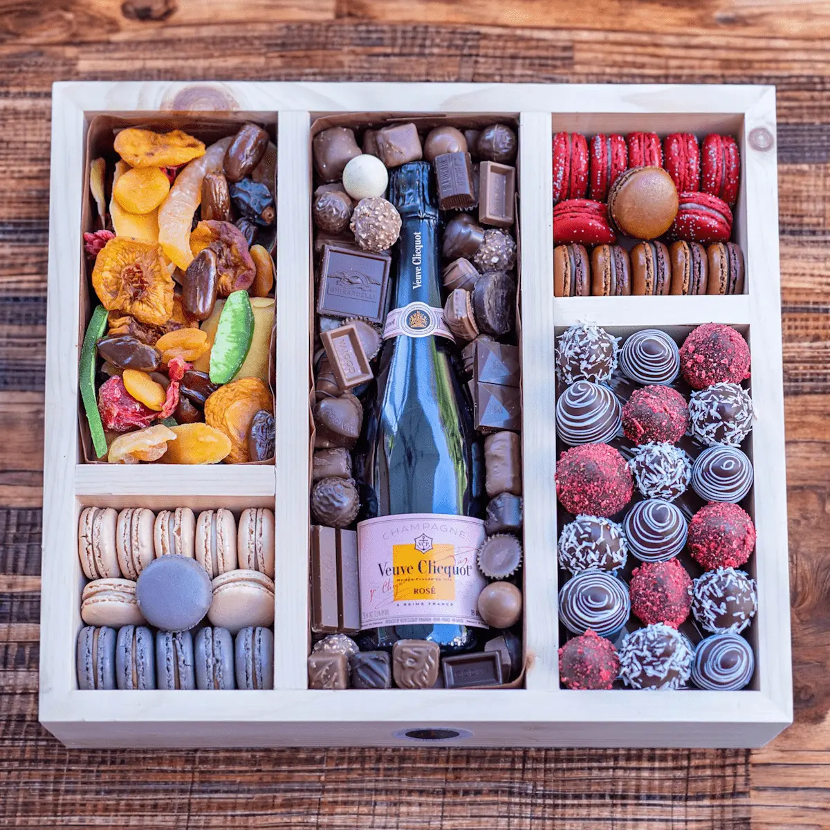 Luxury celebrations gift box with champagne and assorted gourmet treats