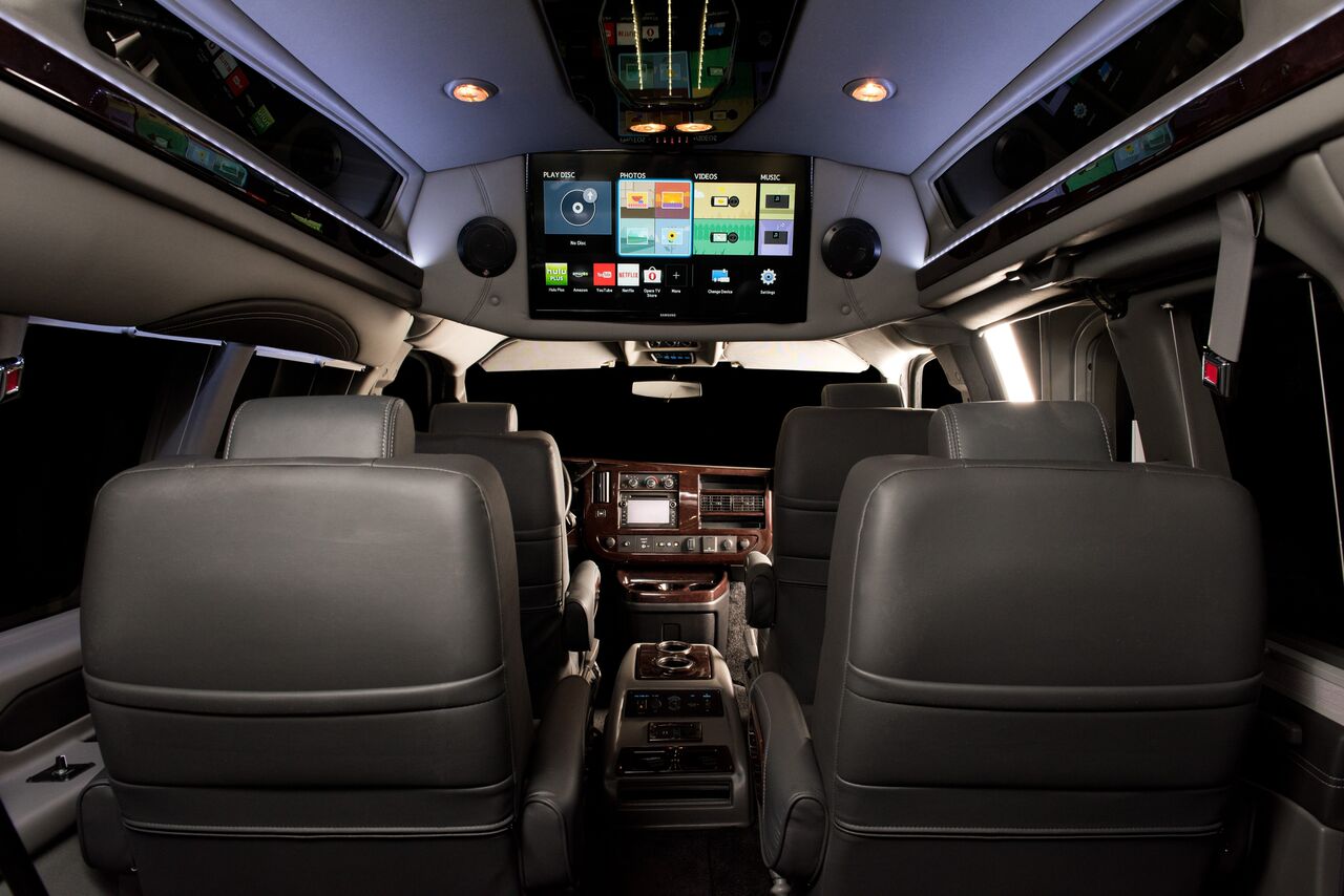 Rear entertainment system with large HDTV in a Chevy Explorer