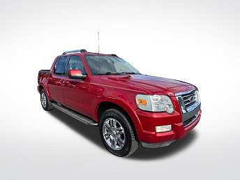 Silver Ford Explorer Sport Trac for sale showing front profile
