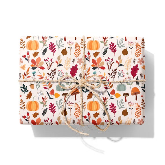 Autumn leaf and pumpkin gift wrapping paper roll with rustic twine