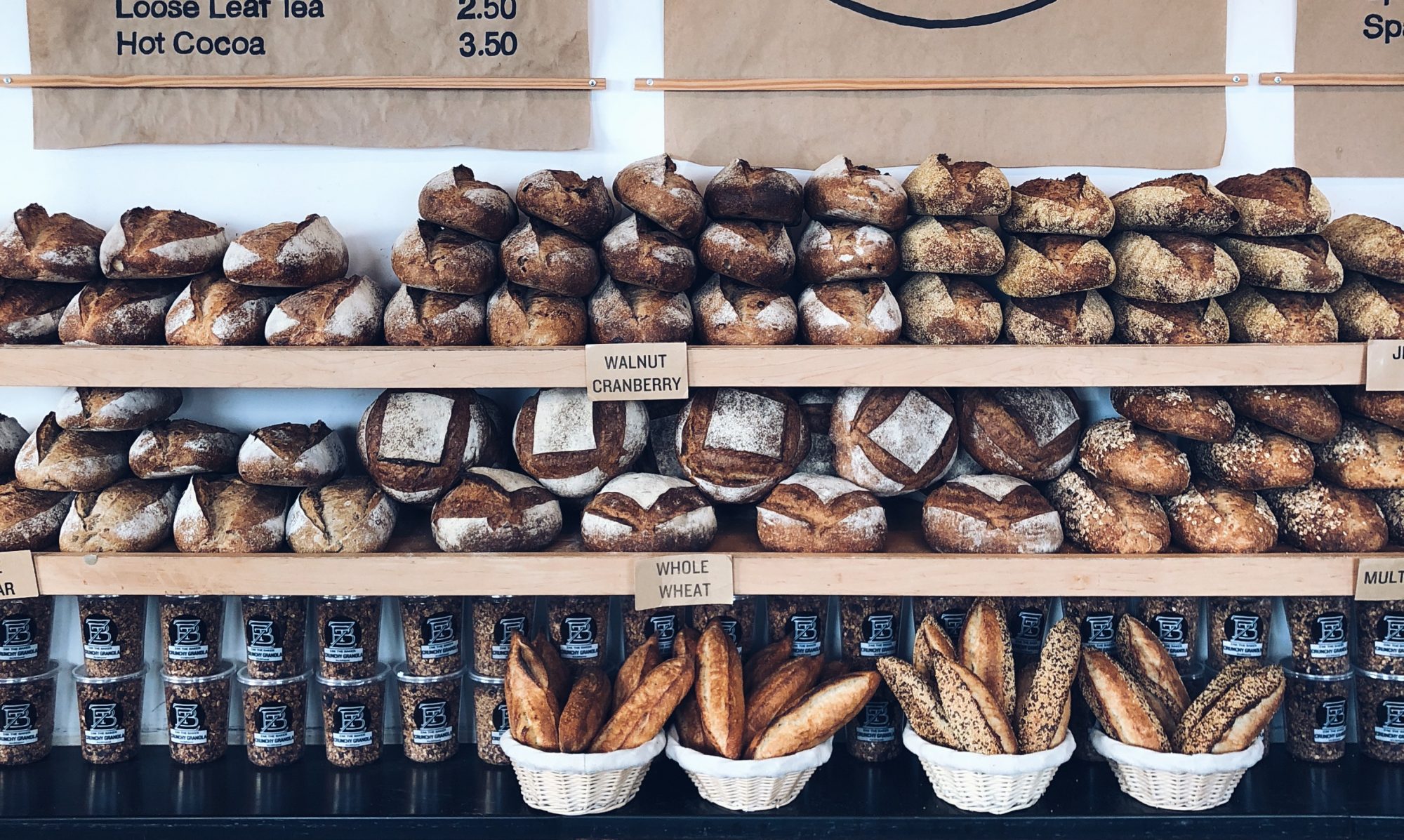 Interior of Zak the Baker cafe showing the bustling atmosphere and bread displays